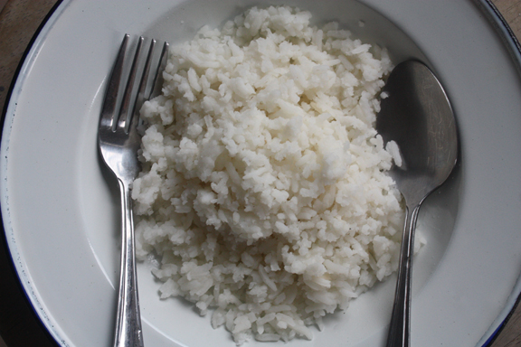A plate of plain rice served with nam prik